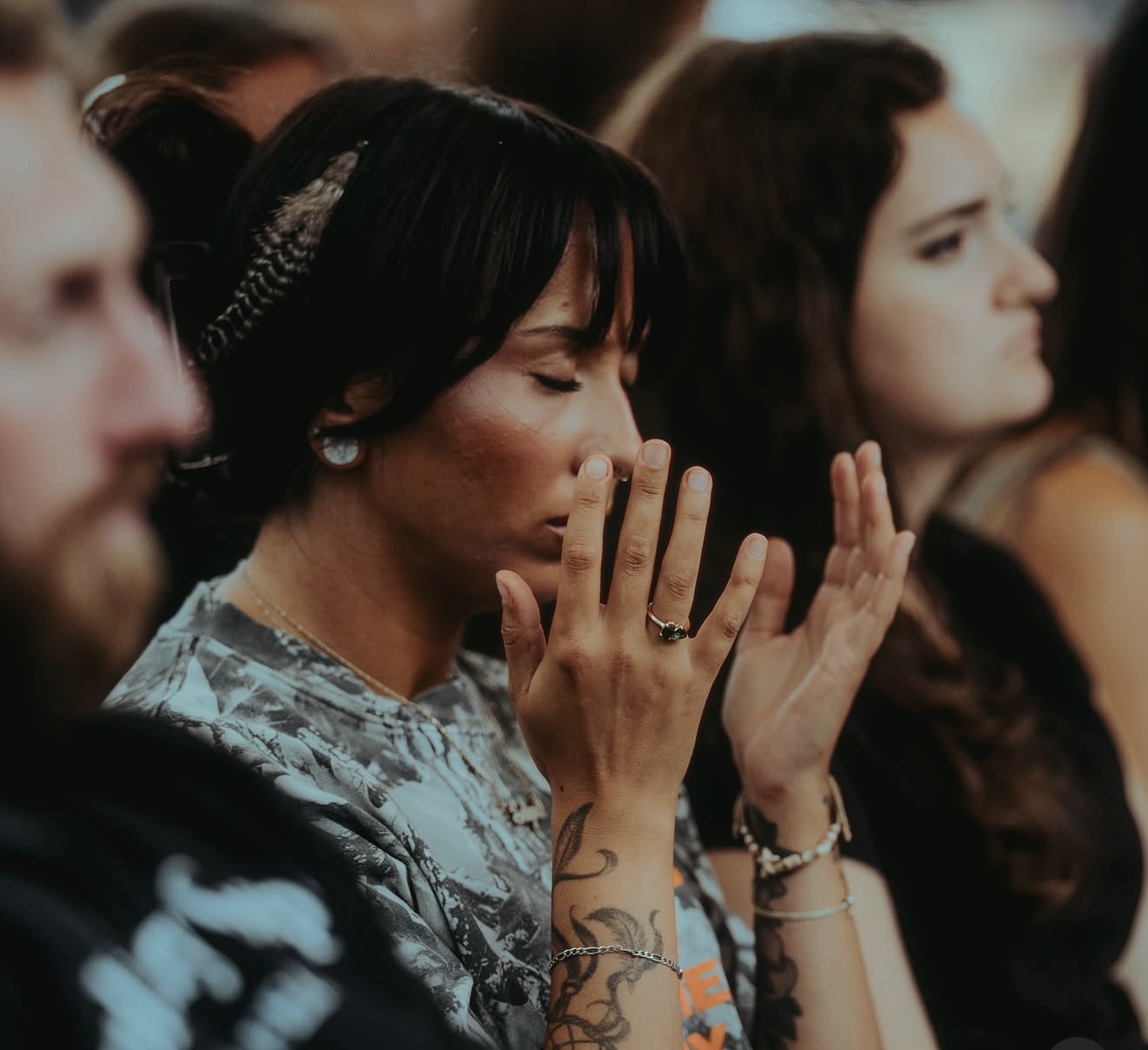 REV15 gathering, praying